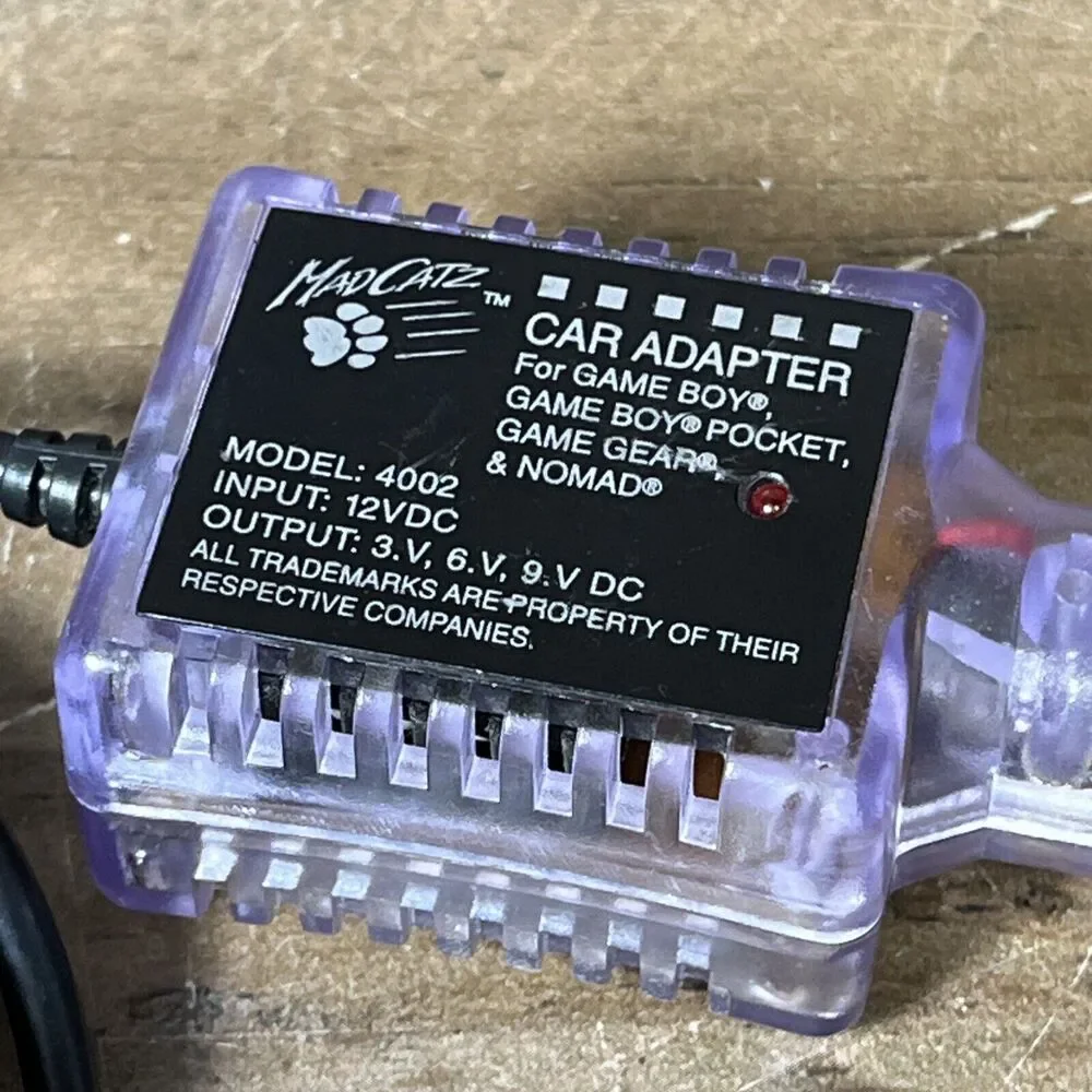 Mad Catz 4002 Car Adapter for Game Boy Pocket Charger Nomad Game Gear Purple